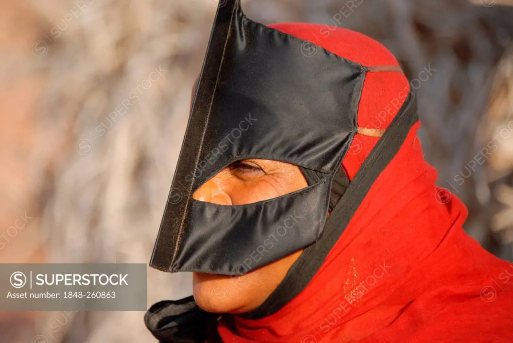 Beduin woman with traditional mask, Wahiba Sands (Wahiba desert), Oman