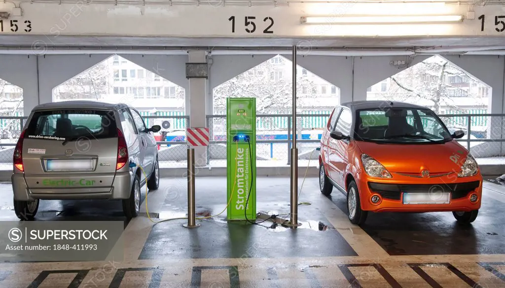 Charging station for the electrical cars of a rental car company in a public garage in Dusseldorf, North Rhine-Westphalia, Germany, Europe