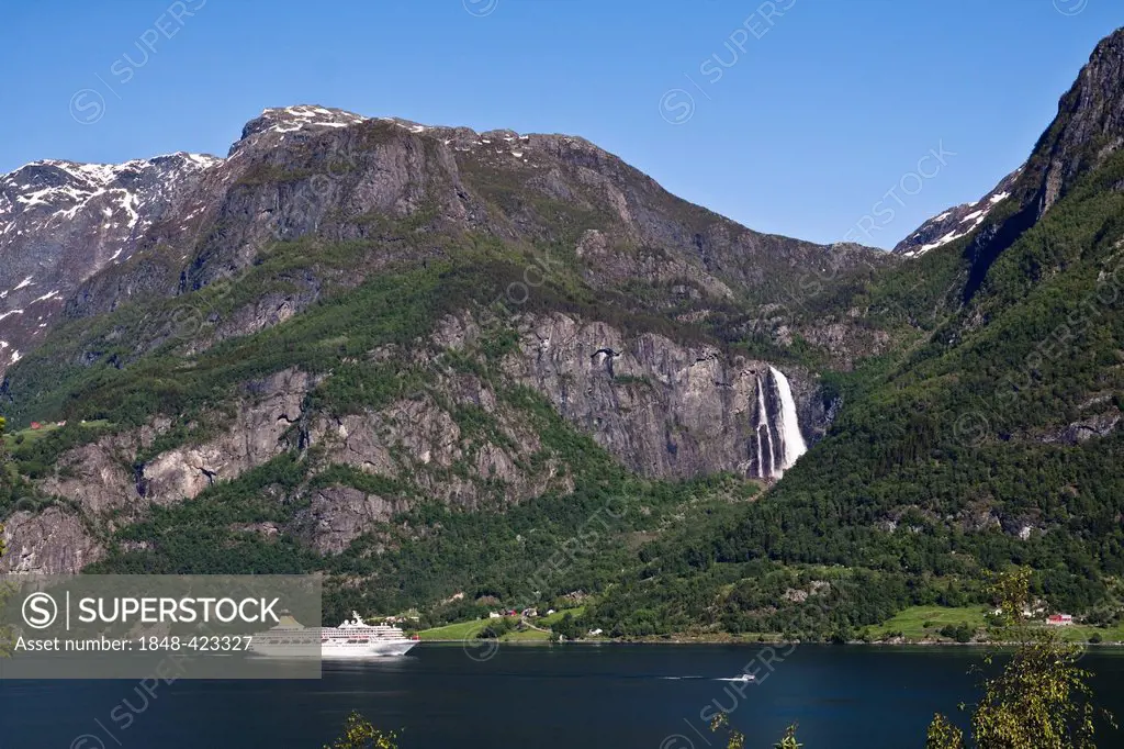 Cruise ship on the Lustrafjord in front of the Feigefossen waterfall, Norway, Scandinavia, Europe