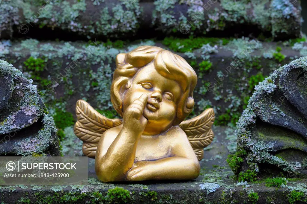 Golden angel figurine