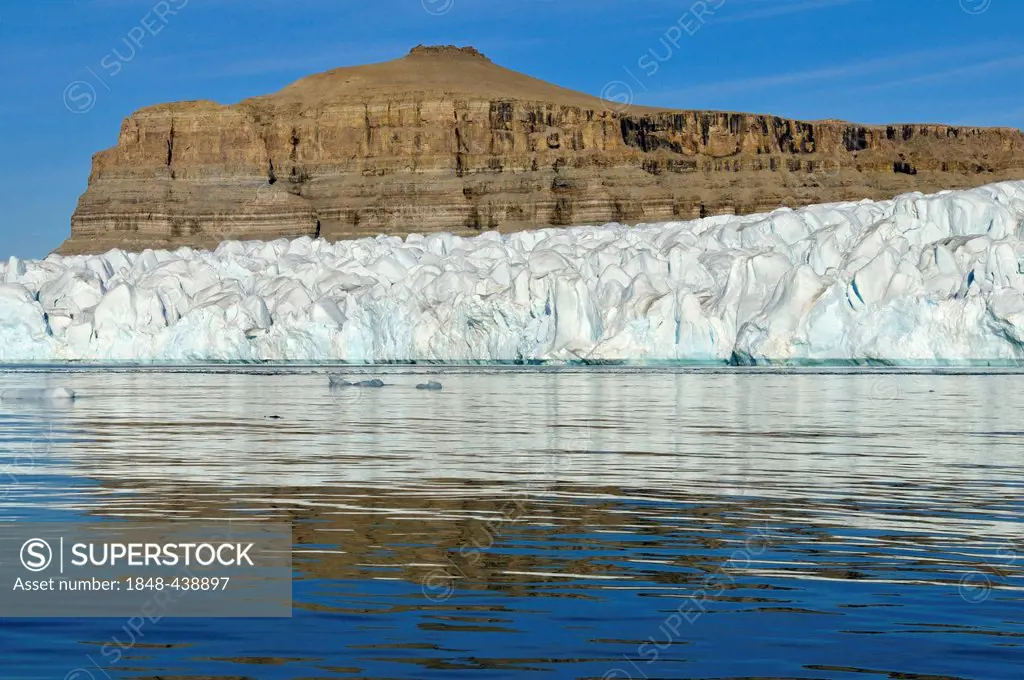 Sedimentary rocks and glacier at Crocker Bay, Devon Island, Northwest Passage, Nunavut, Canada, Arctic