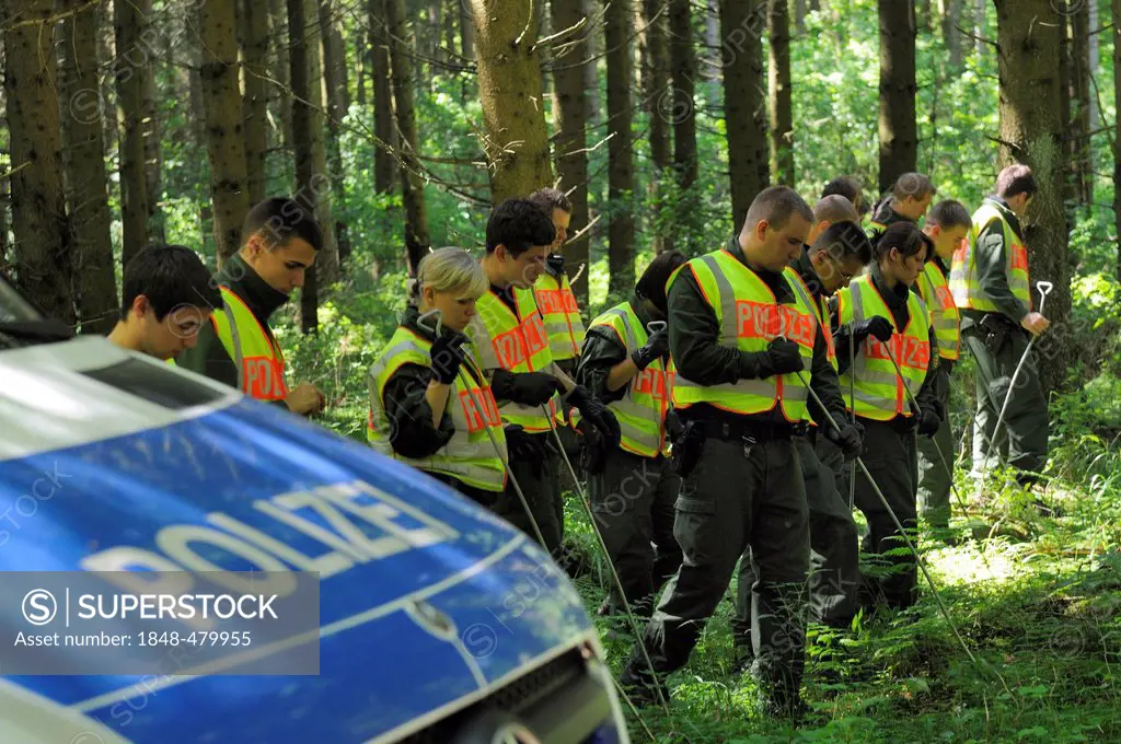 Maria Boegerl kidnapping case, police search team scouring woodlands near the location where a dead body was found in a forest near Niesitz, Heidenhei...