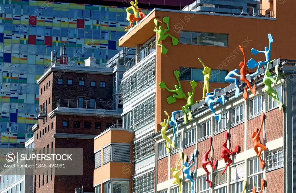 Varied colourful architecture with the Flossies installation by Rosalie in the foreground, Medienhafen media harbour, Duesseldorf, North Rhine-Westpha...