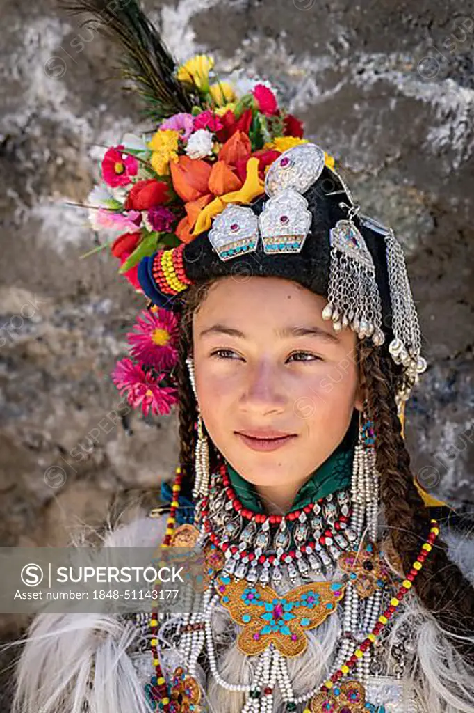 Ladakh, India, August 29, 2018: Portrait of an indigenous girl in traditional costume in Ladakh, India. Illustrative editorial, Asia