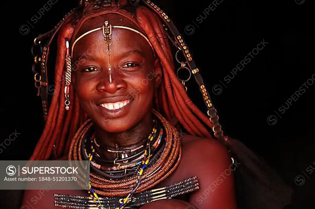 Portrait of a married Himba woman, smiling, Kunene District, Kaokoveld, Namibia, Africa