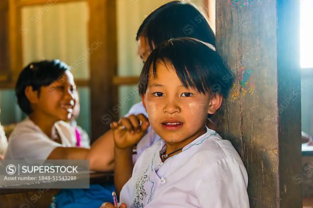 Boy looking at camera, pupil at school, Shan State, Myanmar, Asia