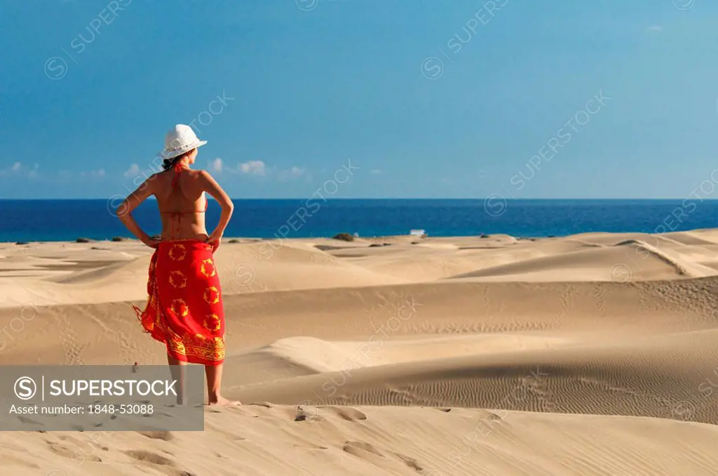 Woman in the sand dunes of Maspalomas, Gran Canaria, Canary Islands, Spain, Europe