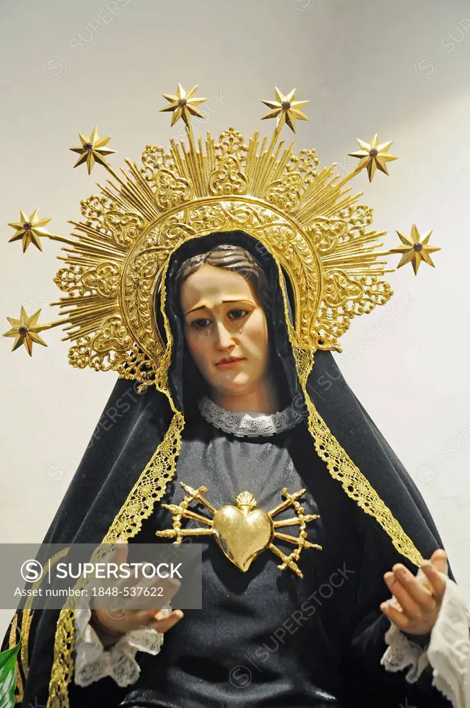 The Virgin Mary, statue of a saint, gloriole with stars, heart, daggers, church of Saint Gertrude, Ibiza island, Pityuses, Balearic Islands, Spain, Eu...