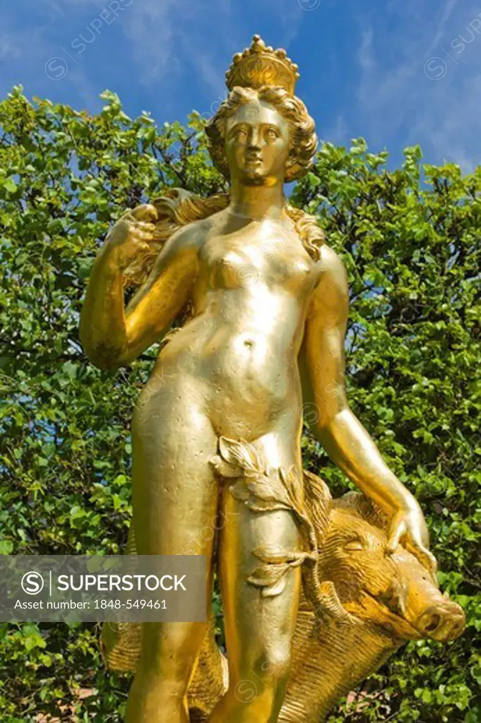Golden statue of the hunting goddess Diana with boar's head, castle gardens, Schloss Schwetzingen castle, 18th century, Schwetzingen, Baden-Wuerttembe...