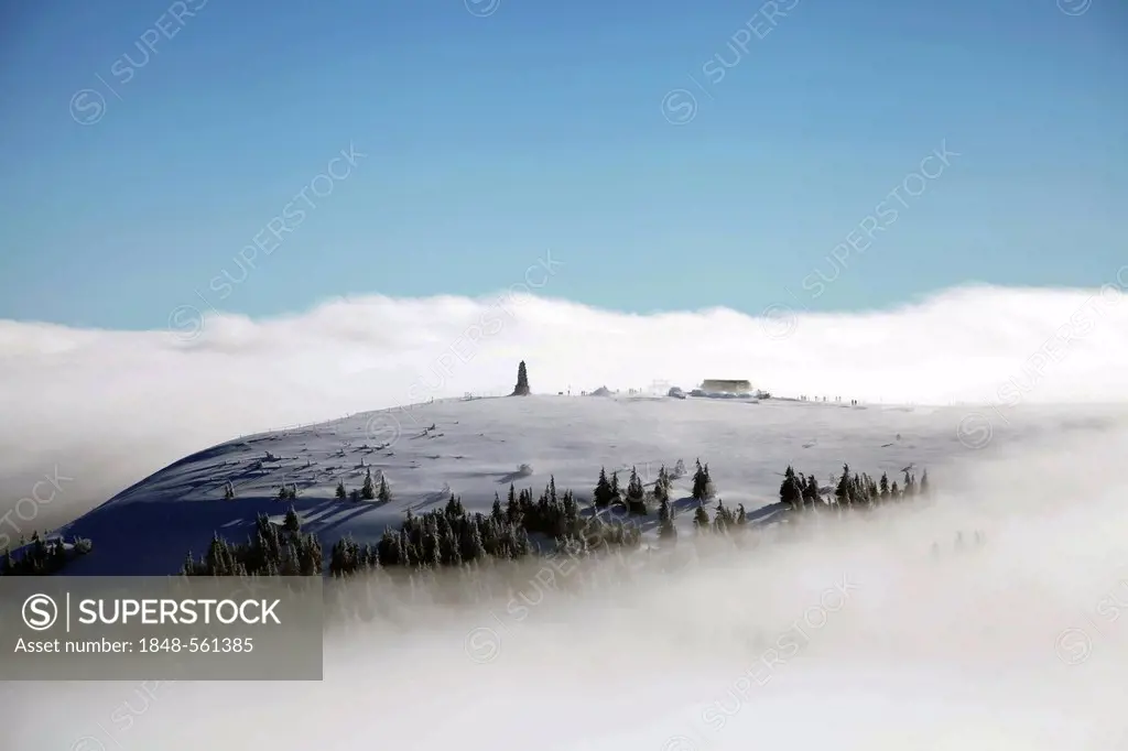 View from the summit of Feldberg Mountain towards Seebuck Mountain with Feldbergturm Tower above a sea of fog, Black Forest, Baden-Wuerttemberg, Germa...