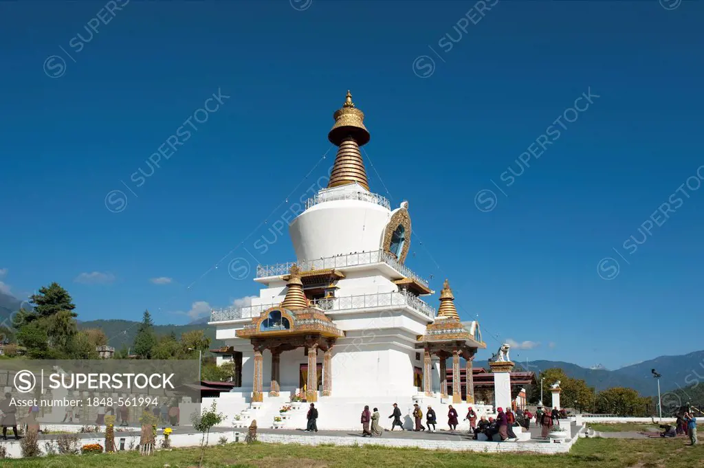 Tibetan Buddhism, believers circling the large white stupa, Memorial Chorten, capital of Thimphu, the Himalayas, Kingdom of Bhutan, South Asia, Asia