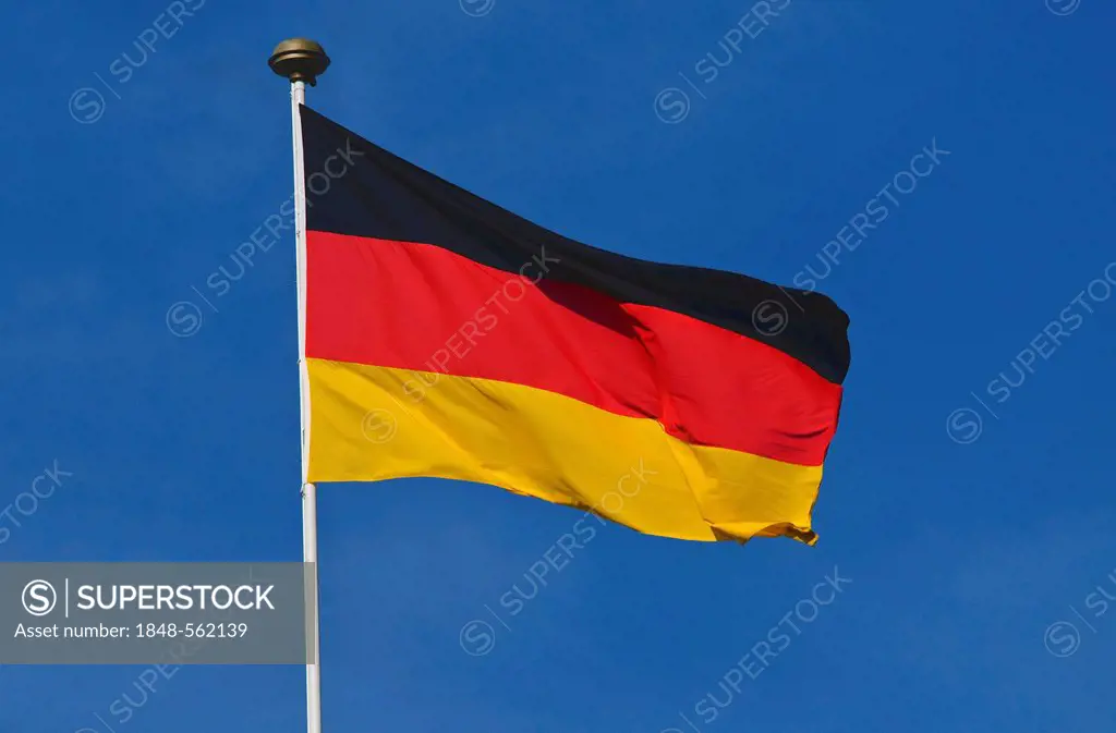 German national flag against a blue sky