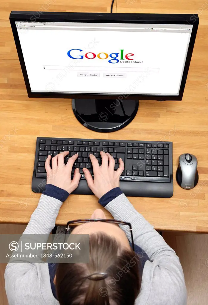 Woman surfing the internet with a computer, Google Germany, web search