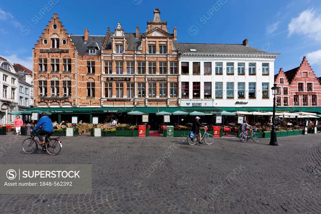 Guild houses with street restaurants on Grote Markt market square, historic city centre of Bruges, UNESCO World Heritage Site, West Flanders, Flemish ...