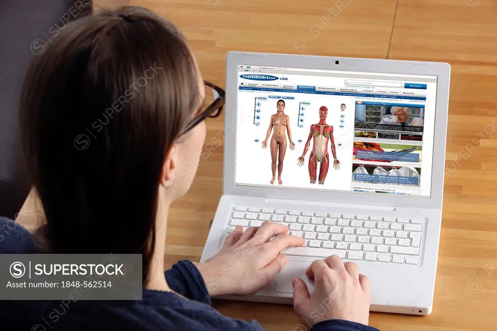 Woman surfing the internet with a laptop, medical website, Netdoktor, online guide for health issues, analysis of symptoms