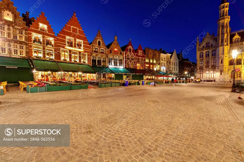 Guild houses with street restaurants on Grote Markt market square, historic town centre of Bruges, UNESCO World Heritage Site, West Flanders, Flemish ...