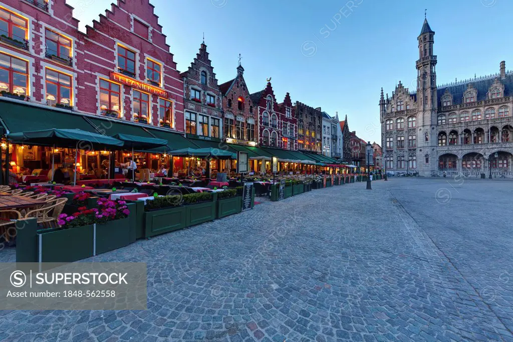 Guild houses with street restaurants on Grote Markt market square, historic town centre of Bruges, UNESCO World Heritage Site, West Flanders, Flemish ...