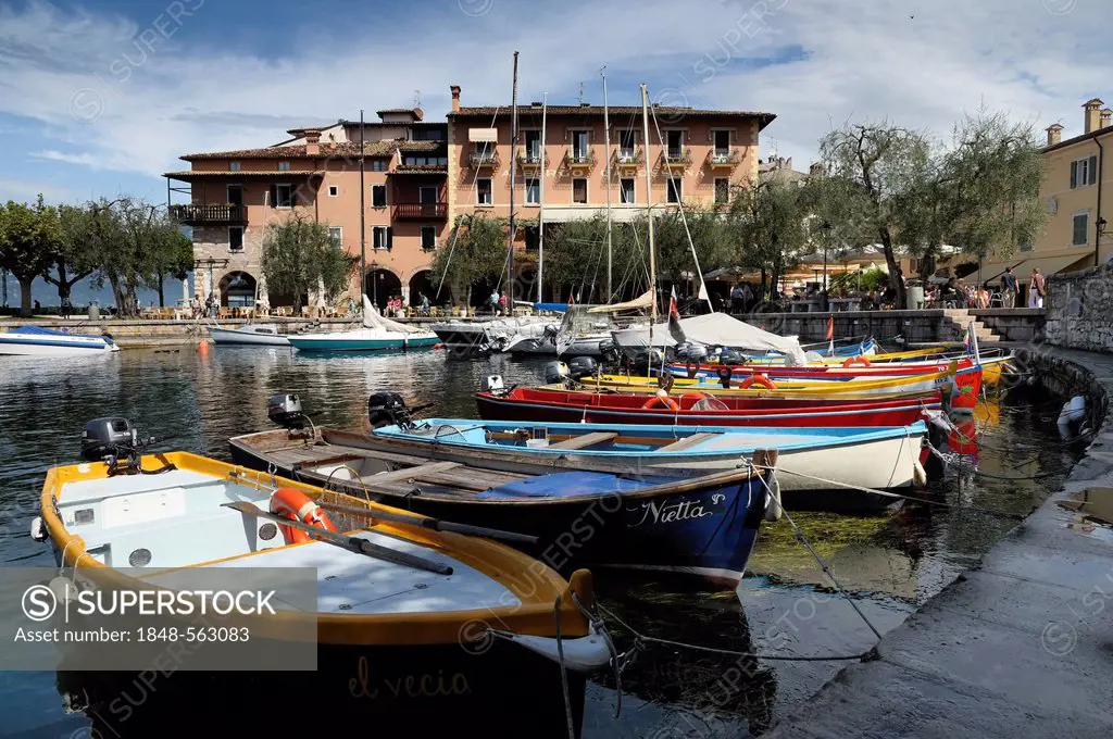 Fishing boats in the harbor of Torri del Benaco, Lake Garda, Verona Province, Veneto, northern Italy, Italy, Europe