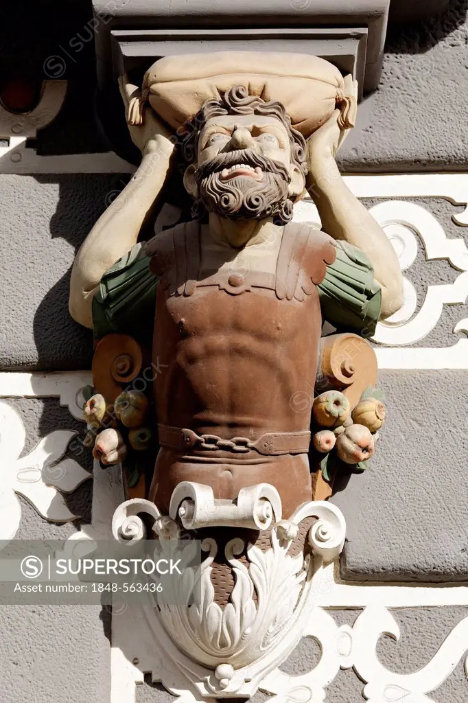 Atlas with a pillow on its head, sculptural decoration on a Renaissance facade, Haus zum Stockfisch Museum, Erfurt, Thuringia, Germany, Europe, Public...