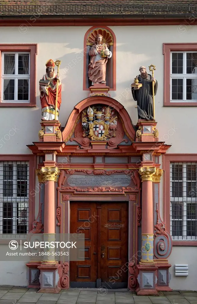 Renaissance portal with the figures of St. Boniface, Jesus Christ and St. Benedict of Nursia, convent building of the former Benedictine monastery at ...