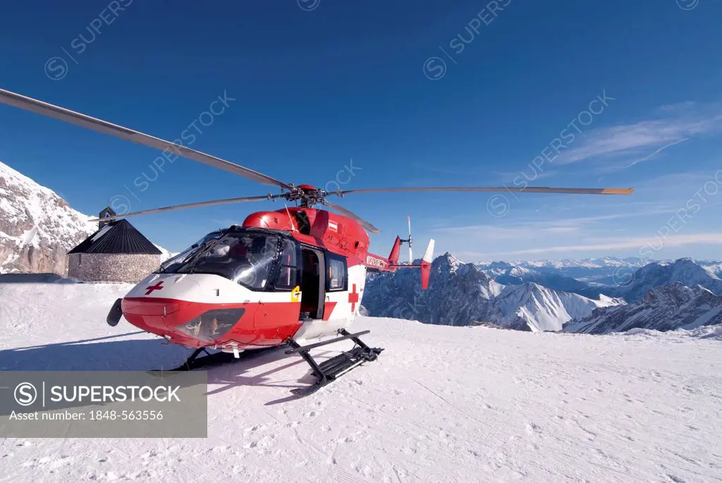 Red cross helicopter in the Zugspitze, highest point in Germany