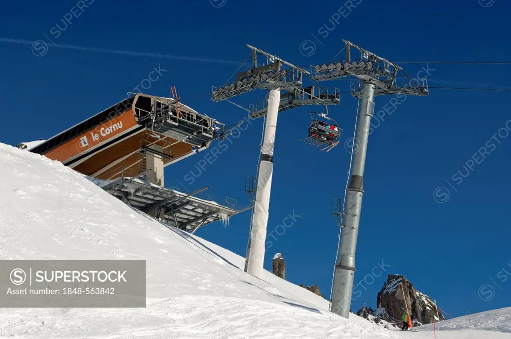 Mountain station of the Le Cornu chairlift against a blue sky, Chamonix ski resort, Haute Savoie, France, Europe