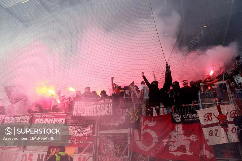Fans of 1. FC Kaiserslautern have ignited fireworks, football Bundesliga, FSV Mainz 05 vs 1. FC Kaiserslautern, Coface-Arena, Mainz, Rhineland-Palatin...