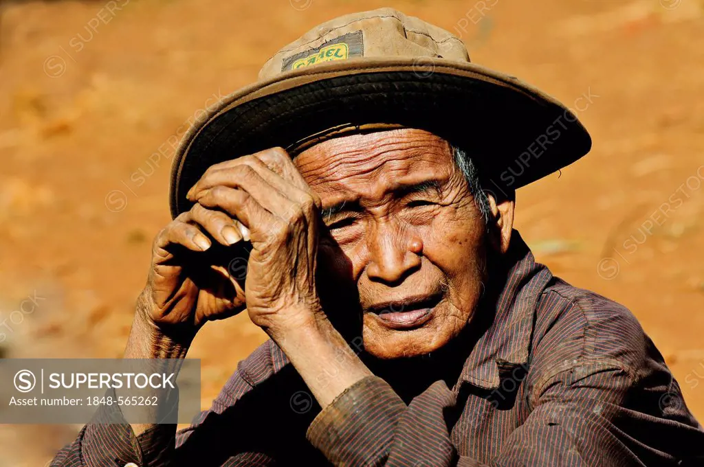 Old man wearing a hat in northeastern Cambodia, Southeast Asia, Asia