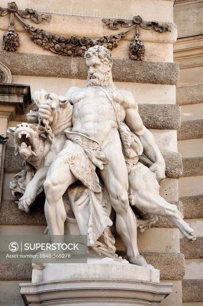 Hercules bringing Cerberus back from the Underworld, 1893, sculpture in front of the Hofburg Imperial Palace, St. Michael's Square, Vienna, Austria, E...
