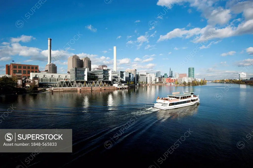 View of Frankfurt's Westhafen harbour, an excursion boat on the Main River and skyscrapers, Frankfurt am Main, Hesse, Germany, Europe