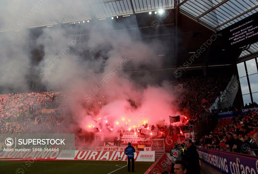 Fans of 1. FC Kaiserslautern have ignited fireworks, football Bundesliga, FSV Mainz 05 vs 1. FC Kaiserslautern, Coface-Arena, Mainz, Rhineland-Palatin...