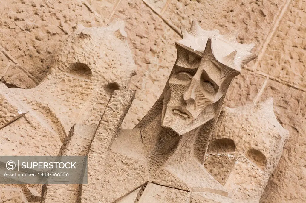Jesus wearing the crown of thorns, a modern stone sculpture on the Passion facade, Sagrada Familia church, Temple Expiatori de la Sagrada Família, Ant...