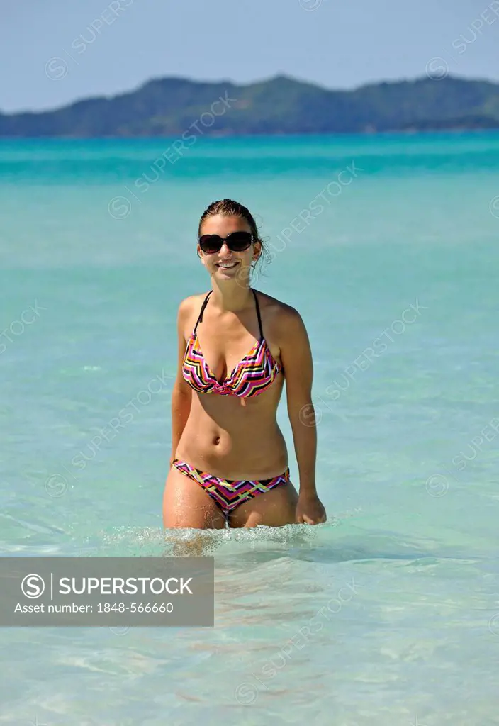 Young woman in the sea, Whitehaven Beach, Whitsunday Island, Whitsunday Islands National Park, Queensland, Australia
