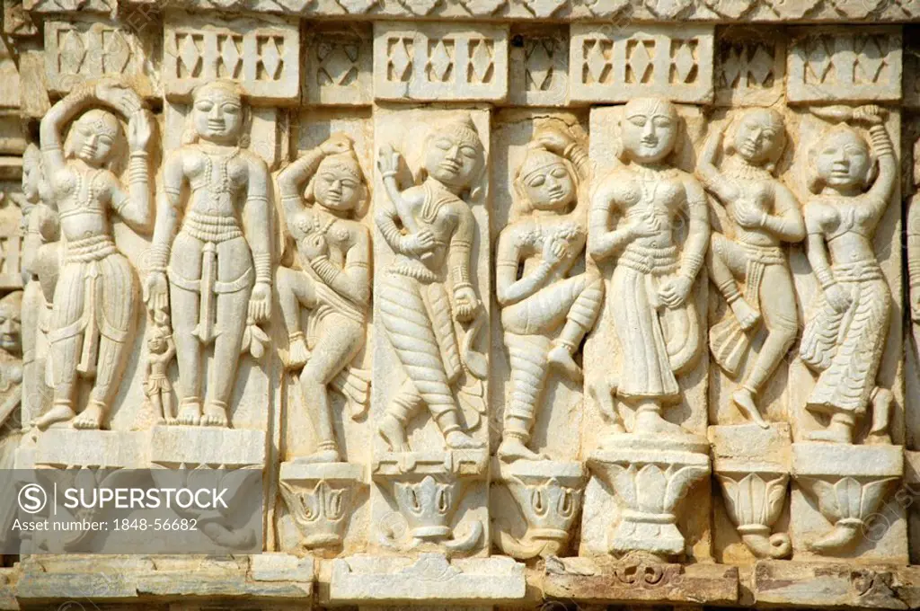 Jainism, reliefs carved in white marble, dancing human figures, Jain Temple Ranakpur, Rajasthan, India, South Asia
