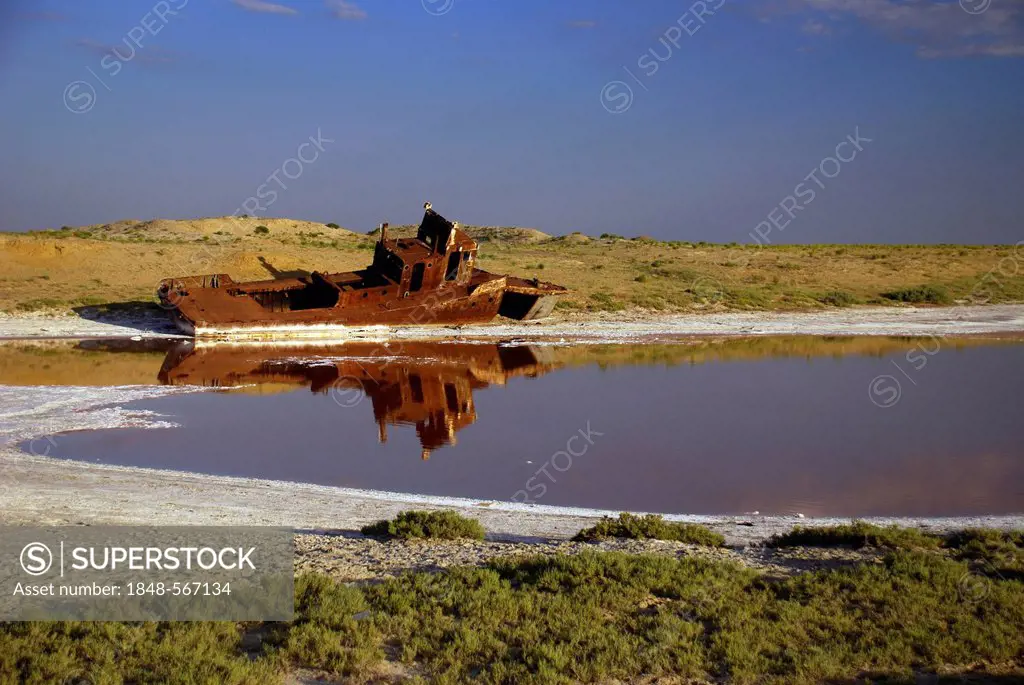 Rusty ship in an already parched section of the Aral Sea, Aral, Kazakhstan, Central Asia