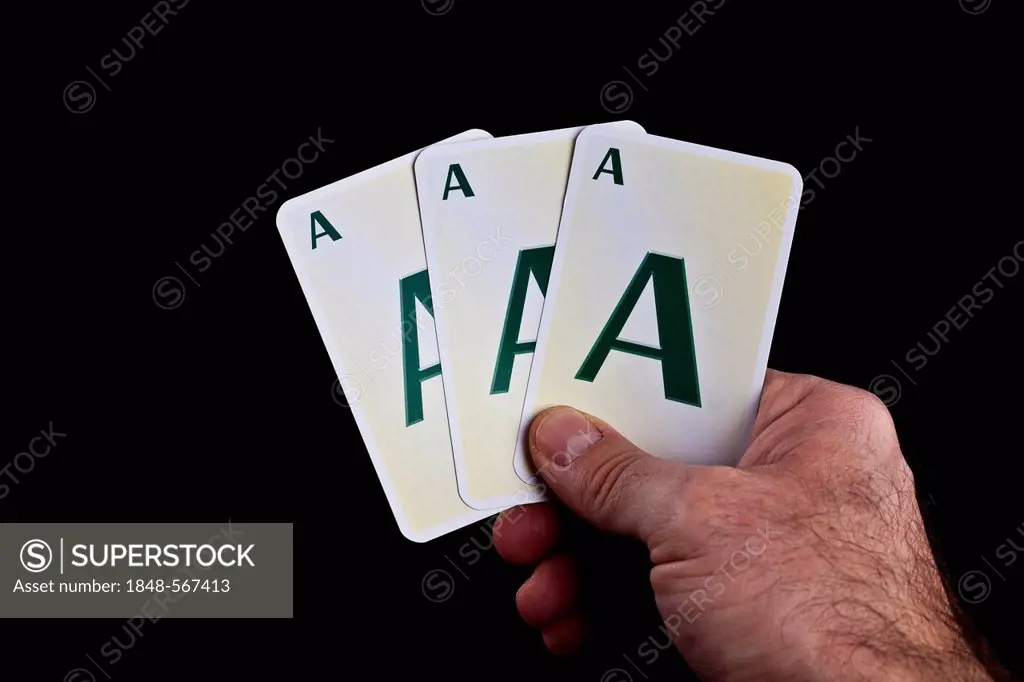 Three playing cards with an A on it, symbolic image for a triple-A rating from the rating agencies