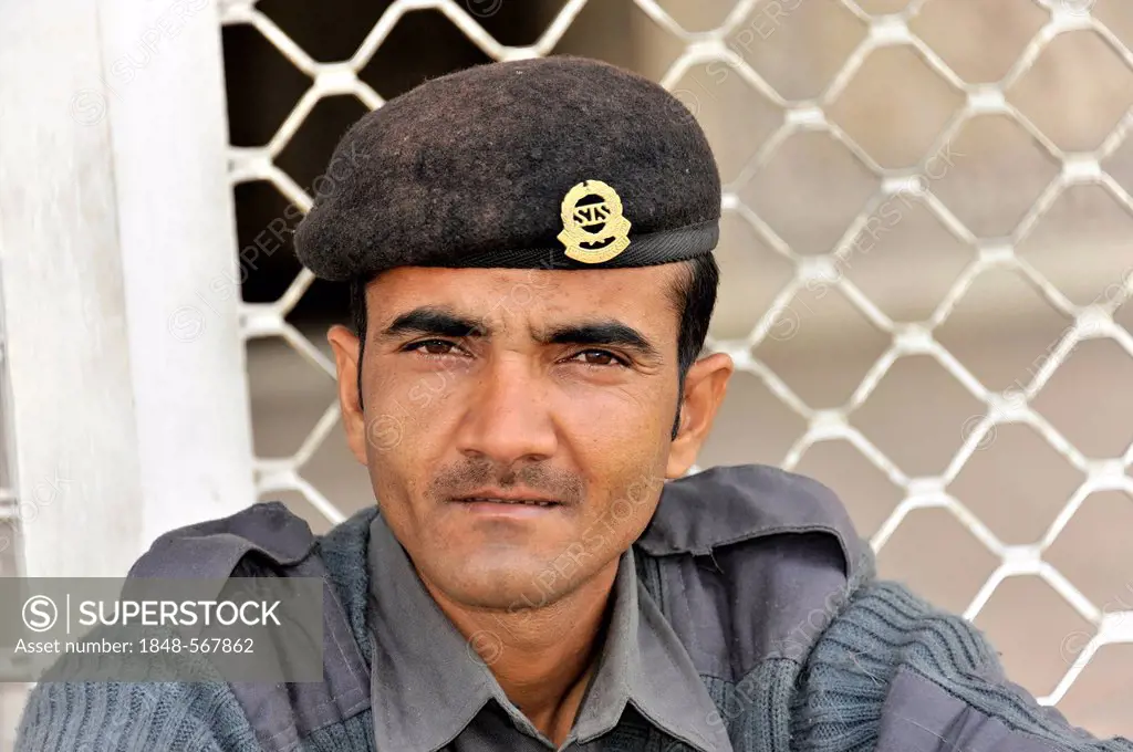 Indian security guard, portrait, at the tomb of Akbar the Great, Sikandra, Agra, Uttar Pradesh, North India, India, Asia