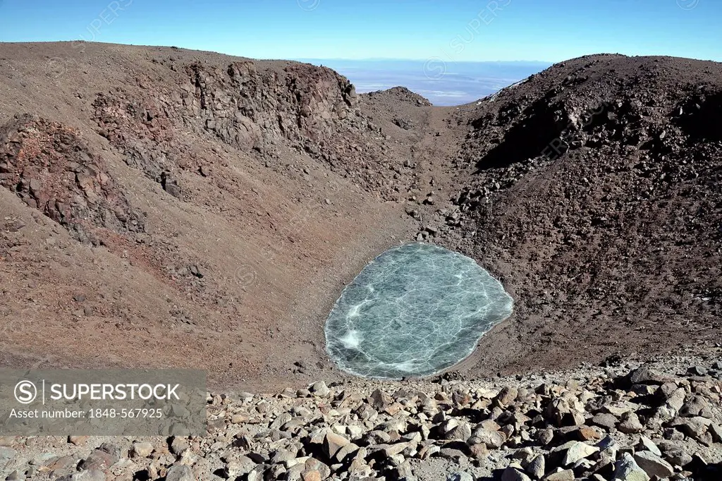 Frozen crater lake, volcanic crater of the Licancabur volcano, 5800m altitude, highest lake in the world, Licancabur, Andes mountain range, Altiplano,...