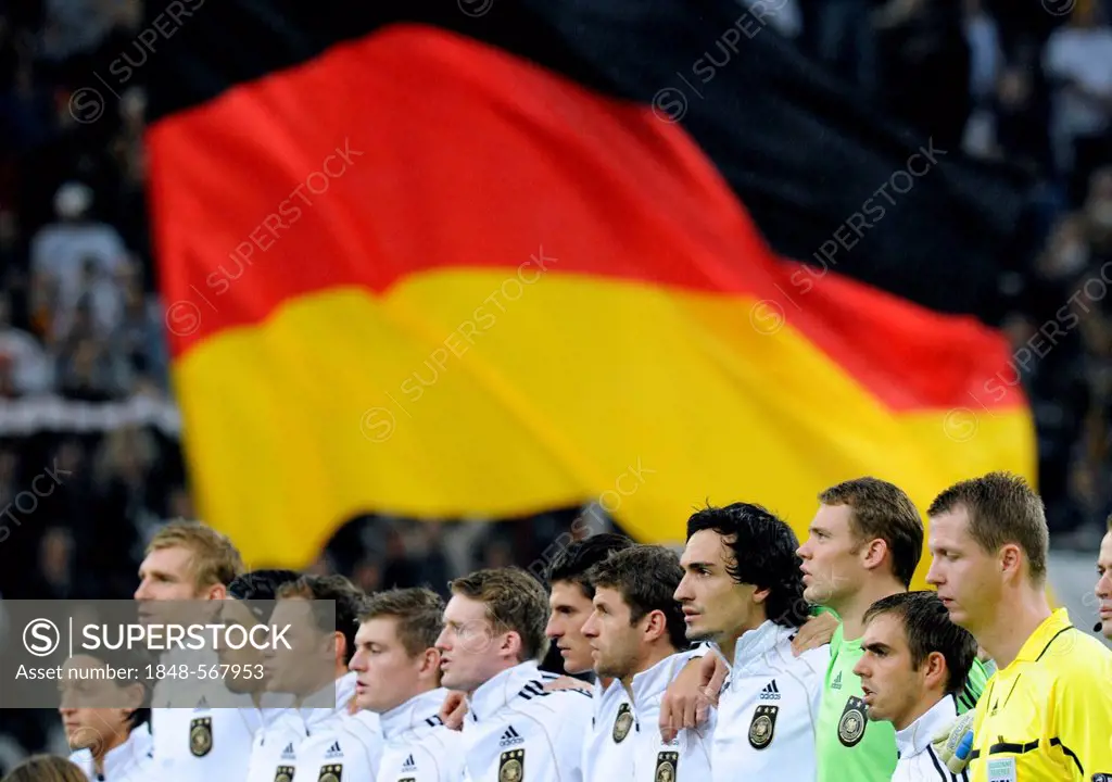 German national team in front of German flag during the national anthem, football qualification match for the UEFA European championship 2012, Germany...