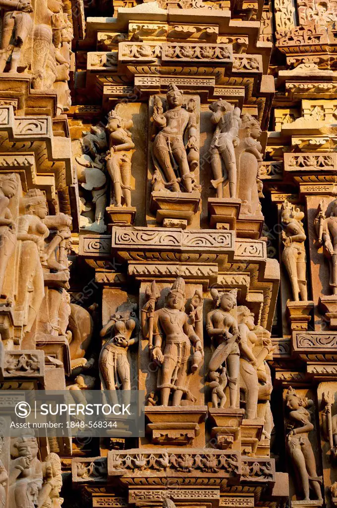 Stone figures, Hindu deities on the facade of a temple, Khajuraho Group of Monuments, UNESCO World Heritage Site, Madhya Pradesh, India, Asia