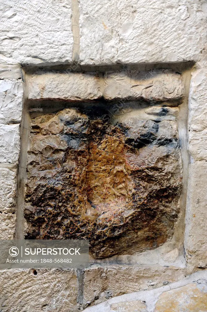 Via Dolorosa, Way of Suffering of Jesus, Simon of Cyrene takes Jesus' cross, the alleged hand print where Jesus supported himself, station five of the...