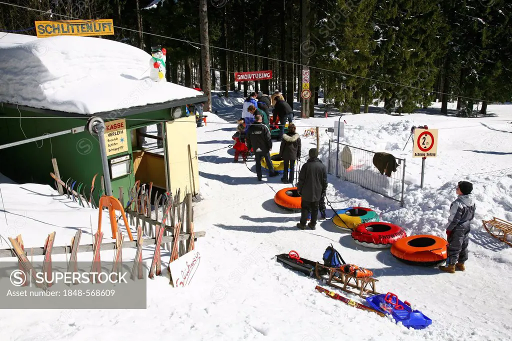 Snowtubing, snow tubing, winter sports resort of Oberhof, Thuringian Forest, Thuringia, Germany, Europe