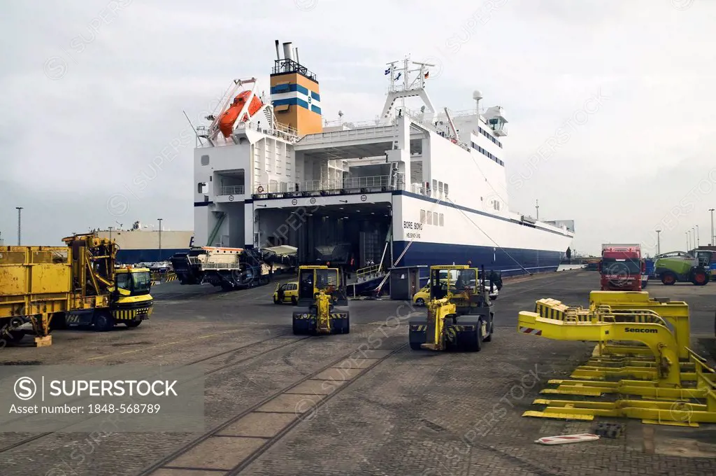 Freight terminal in the overseas port area for large vehicles and machinery, at back cargo ship being loaded, Bremerhaven, Bremen, Germany, Europe