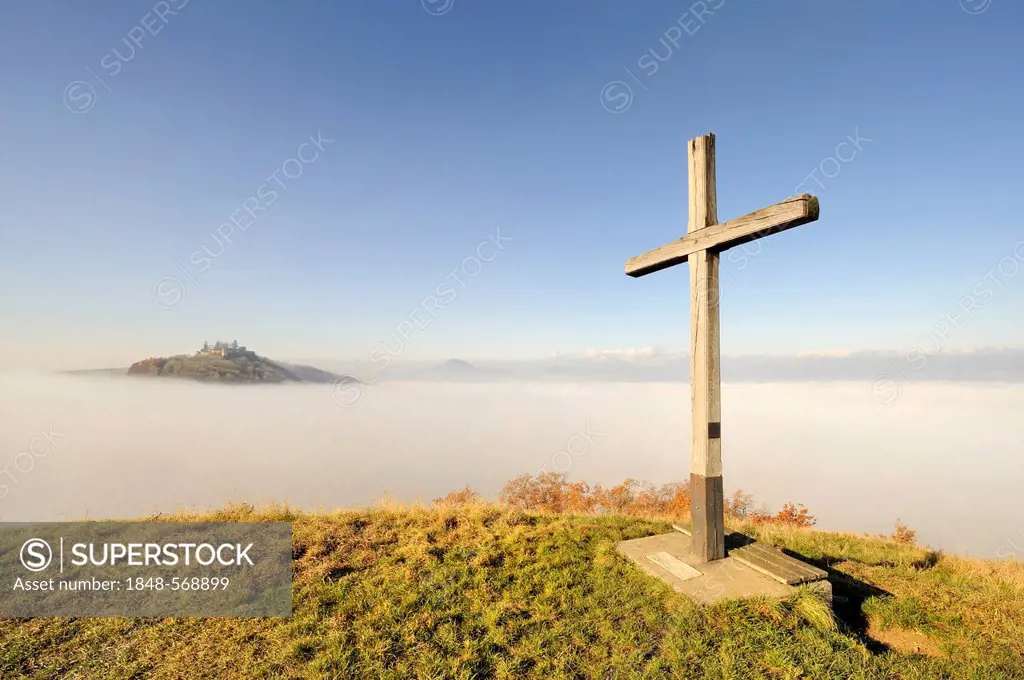 Cross, views across a fog layer during a temperature inversion to Mt Maegdeberg, 614m, Konstanz district, Baden-Wuerttemberg, Germany, Europe