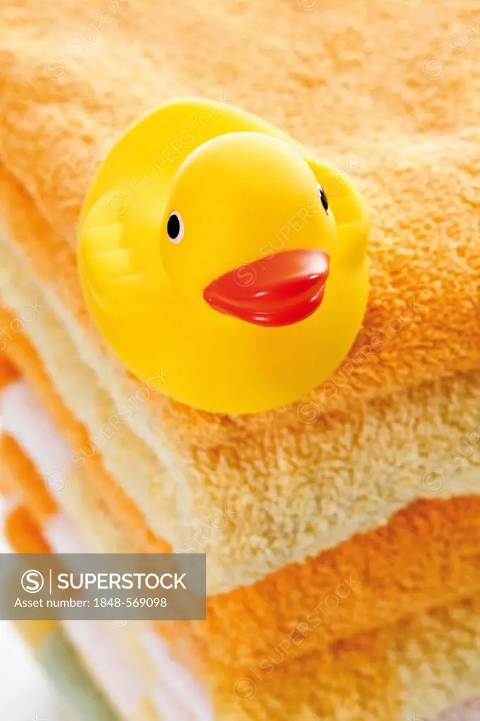 Rubber duck on a stack of towels