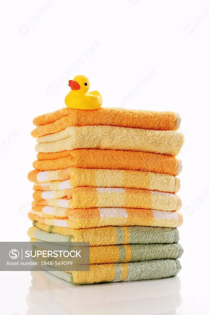 Stack of towels with a rubber duck