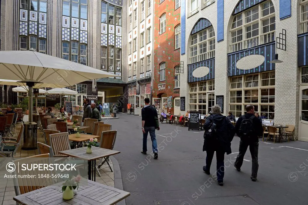 Tourists in the courtyard of the Hackeschen Hoefen, Hackescher Markt, Berlin, Germany, Europe