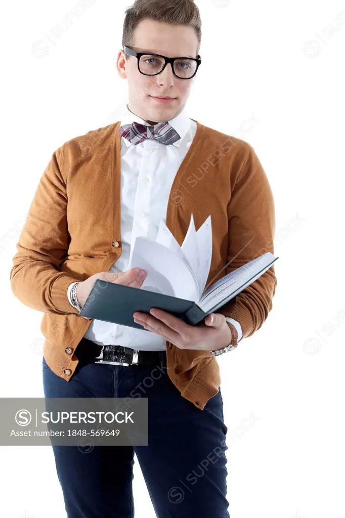 Young man wearing glasses and a bow tie leafing through an appointment diary