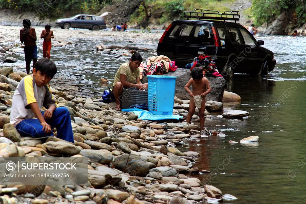 Washing clothes in a river, the Amazon, Bolivia, South America