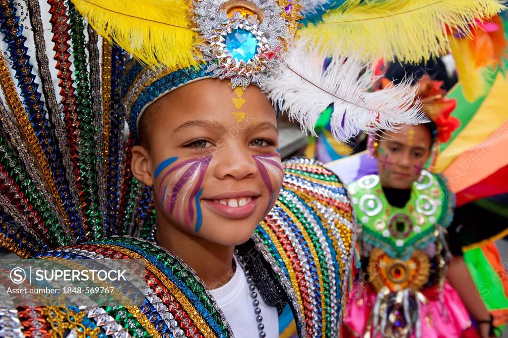 Little boy at Notting Hill Carnival, costume parade, Notting Hill, London, England, United Kingdom, Europe